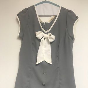 grey and white blouse